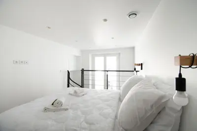 Un ou plusieurs lits dans un hébergement de l'établissement CIA - Flat in Bonne Nouvelle, 4P