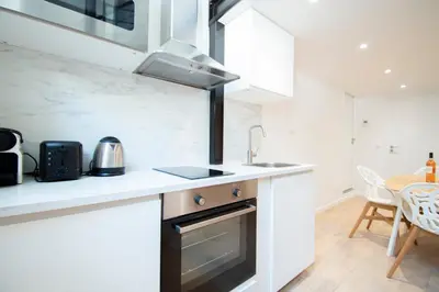 Cuisine ou kitchenette dans l'établissement CIA - Flat in Bonne Nouvelle, 4P