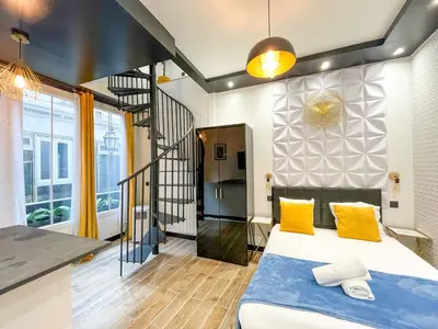 Un ou plusieurs lits dans un hébergement de l'établissement Urban Flat 160 - Fashion week Paris Central flat