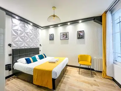 Un ou plusieurs lits dans un hébergement de l'établissement Urban Flat 160 - Fashion week Paris Central flat