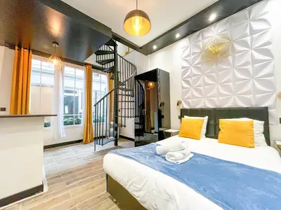 Un ou plusieurs lits dans un hébergement de l'établissement Urban Flat 160 - Fashion week Paris Central flat