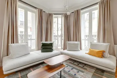 Coin salon dans l'établissement Le Marais Chic by Ecoflats