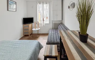 Télévision ou salle de divertissement dans l'établissement Tiny Studio, proche métro & Stade de France