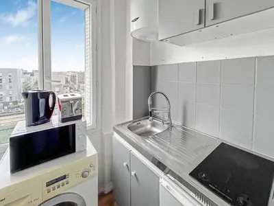 Cuisine ou kitchenette dans l'établissement Tiny Studio, proche métro & Stade de France