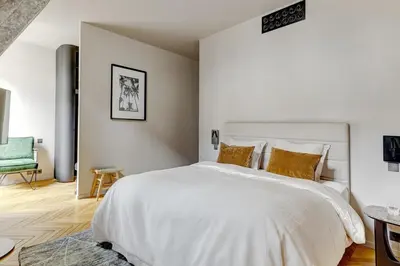 Un ou plusieurs lits dans un hébergement de l'établissement Vendome 2bd