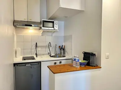 Cuisine ou kitchenette dans l'établissement Le Jaures - Centre ville Metro 3