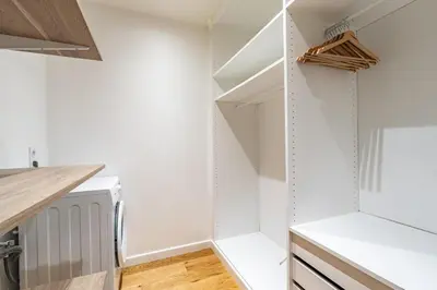 Cuisine ou kitchenette dans l'établissement La Suite des Ternes