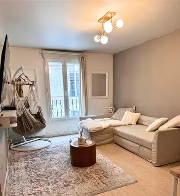 Coin salon dans l'établissement Appart Hotel Paris Cosy Apartment Paris 12eme Gare de Lyon Bercy