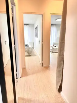 Un ou plusieurs lits dans un hébergement de l'établissement Appart Hotel Paris Cosy Apartment Paris 12eme Gare de Lyon Bercy