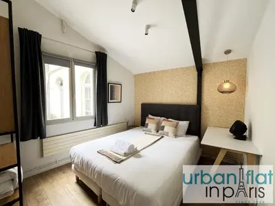 Un ou plusieurs lits dans un hébergement de l'établissement Urban Flat 161 - Luxury 4 Bedrooms Apartment