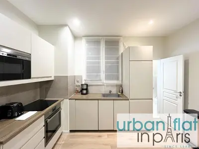 Cuisine ou kitchenette dans l'établissement Urban Flat 64 - Luxury flat Mermoz - Champs Elysees