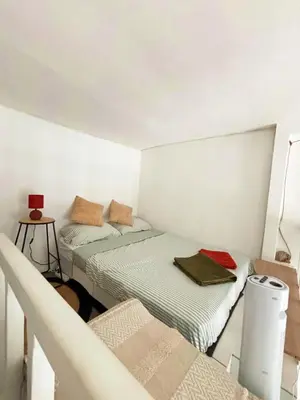 Un ou plusieurs lits dans un hébergement de l'établissement Central Paris Stay with Exceptional Comfort
