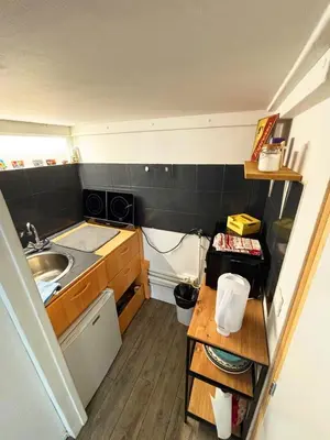 Cuisine ou kitchenette dans l'établissement Central Paris Stay with Exceptional Comfort