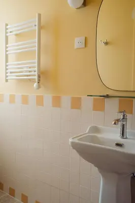 Salle de bains dans l'établissement LALA Hôtel