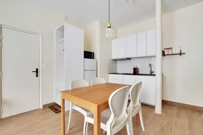 Cuisine ou kitchenette dans l'établissement Cozy Apartment 2BR 6P - Boulets Nation