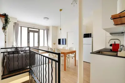 Cuisine ou kitchenette dans l'établissement Cozy Apartment 2BR 6P - Boulets Nation
