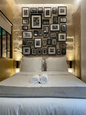 Un ou plusieurs lits dans un hébergement de l'établissement Cozy Loft Montmartre Place des Abbesses Sacré Cœur