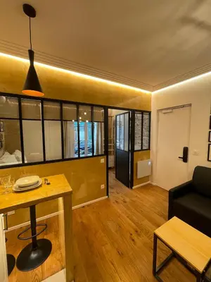 Coin salon dans l'établissement Cozy Loft Montmartre Place des Abbesses Sacré Cœur