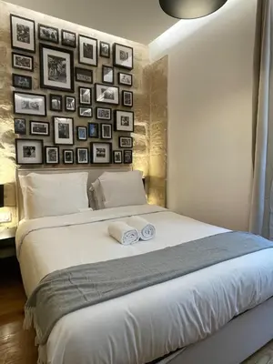 Un ou plusieurs lits dans un hébergement de l'établissement Cozy Loft Montmartre Place des Abbesses Sacré Cœur