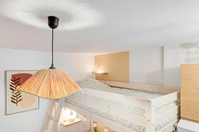 Un ou plusieurs lits dans un hébergement de l'établissement Petit studio cosy quartier branché entre Bastille et Nation
