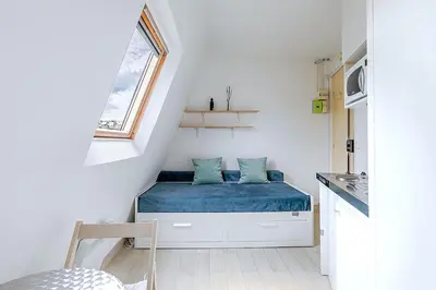 Un ou plusieurs lits dans un hébergement de l'établissement Petit studio 16ème arrondissement - Boulogne