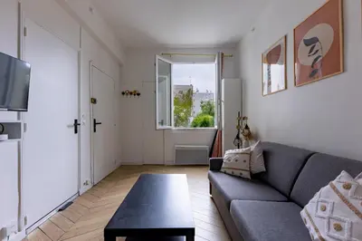 Coin salon dans l'établissement Romantic 3 Stars - Studio suite by Canal Saint-Martin