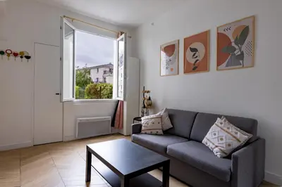 Coin salon dans l'établissement Romantic 3 Stars - Studio suite by Canal Saint-Martin