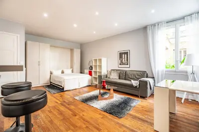 Un ou plusieurs lits dans un hébergement de l'établissement Elegant studio Saint-Dominique