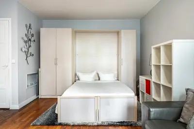 Un ou plusieurs lits dans un hébergement de l'établissement Elegant studio Saint-Dominique