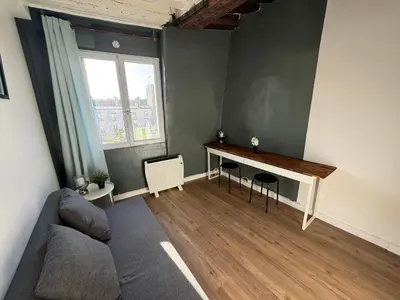 Coin salon dans l'établissement Chez Eric Studio au coeur de Châtelet