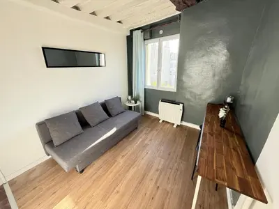 Coin salon dans l'établissement Chez Eric Studio au coeur de Châtelet