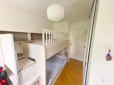 Un ou plusieurs lits dans un hébergement de l'établissement Lux Belleville