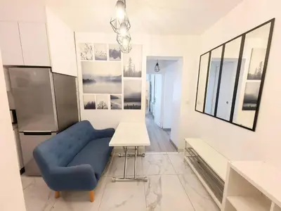 Cuisine ou kitchenette dans l'établissement Marais Side Apartment Paris 11e