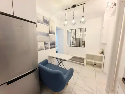 Cuisine ou kitchenette dans l'établissement Marais Side Apartment Paris 11e