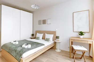 Un ou plusieurs lits dans un hébergement de l'établissement Appartement de Prestige au Marais pour 6 Voyageurs