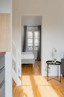 Un ou plusieurs lits dans un hébergement de l'établissement Brand New - Exquisite and Sunny Parisian Loft