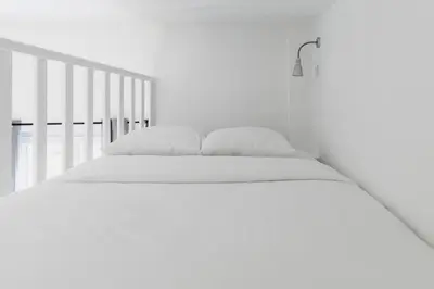 Un ou plusieurs lits dans un hébergement de l'établissement Brand New - Exquisite and Sunny Parisian Loft