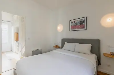 Un ou plusieurs lits dans un hébergement de l'établissement Brand New - Exquisite and Sunny Parisian Loft