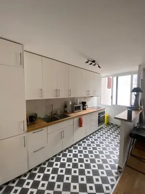 Cuisine ou kitchenette dans l'établissement Spacious and Elegant 3 Bedrooms Apartment near Metro and Bois de Vincennes
