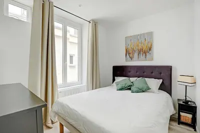 Un ou plusieurs lits dans un hébergement de l'établissement élégant deux pièces St-Germain-des-Prés