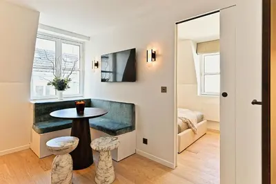 Coin salon dans l'établissement Élégant esprit suite d'hôtel