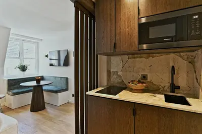 Cuisine ou kitchenette dans l'établissement Élégant esprit suite d'hôtel