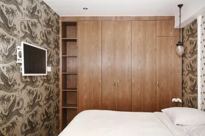 Télévision ou salle de divertissement dans l'établissement Appartement cosy Montmartre - Paris 18 - 4P