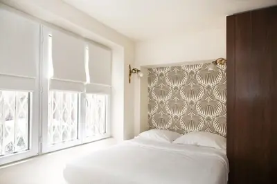 Un ou plusieurs lits dans un hébergement de l'établissement Appartement cosy Montmartre - Paris 18 - 4P