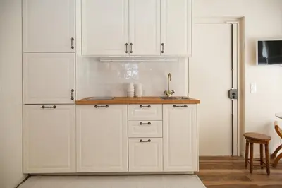 Cuisine ou kitchenette dans l'établissement Appartement cosy Montmartre - Paris 18 - 4P