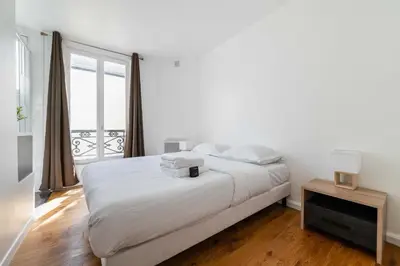 Un ou plusieurs lits dans un hébergement de l'établissement 2 pieces cosy hopital bichat - paris 18 - 2P