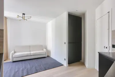 Un ou plusieurs lits dans un hébergement de l'établissement Appartement 2 Pièces I 8 min à pied de la Défense