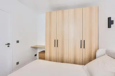 Un ou plusieurs lits dans un hébergement de l'établissement Appartement 2 Pièces I 8 min à pied de la Défense