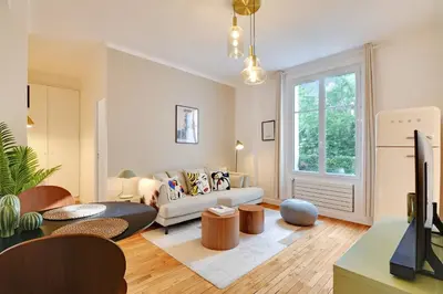 Coin salon dans l'établissement Calm Square Flat