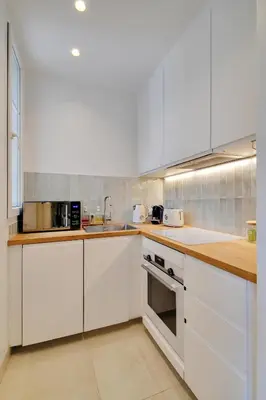 Cuisine ou kitchenette dans l'établissement Calm Square Flat
